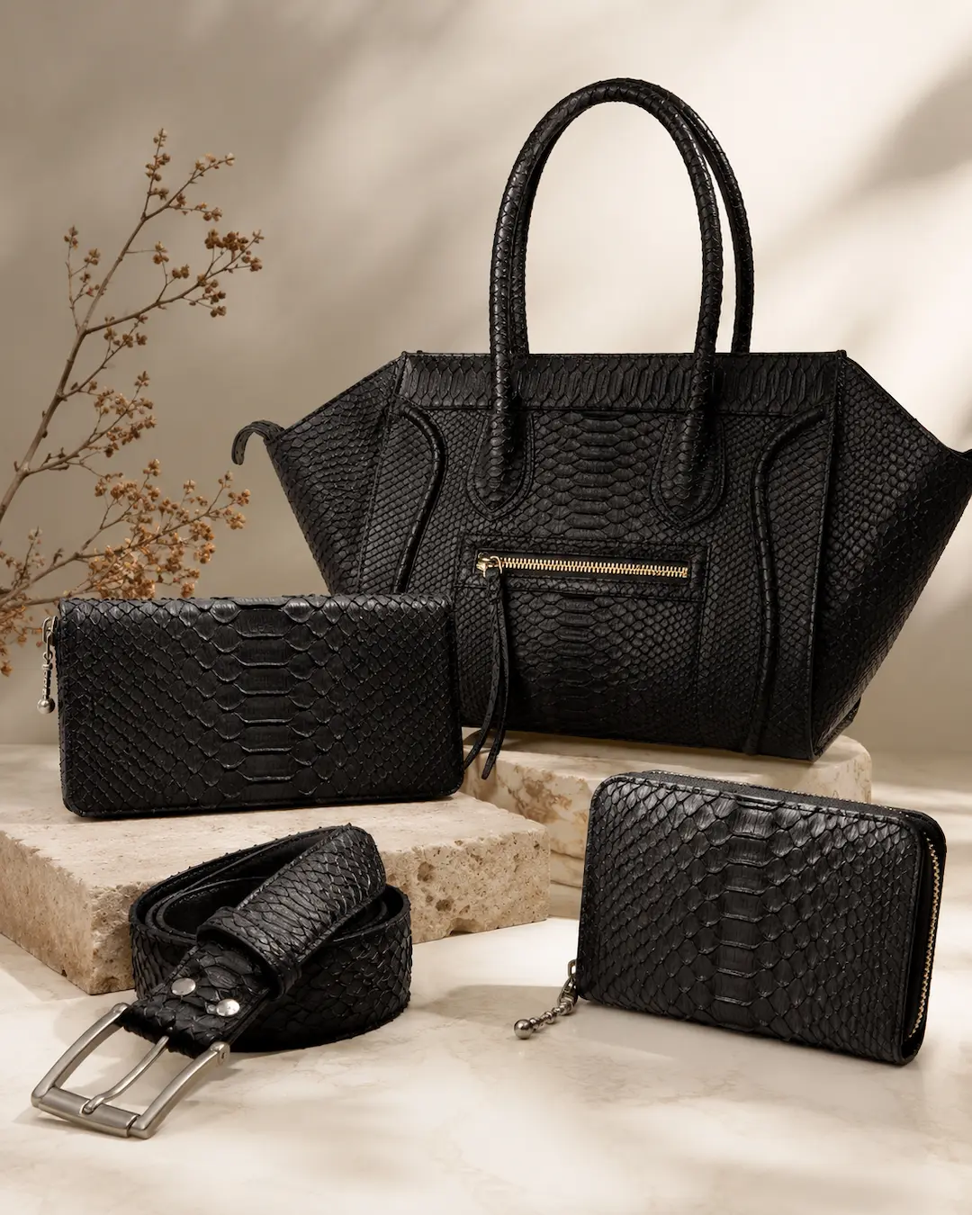 Black leather bags, wallets and belts